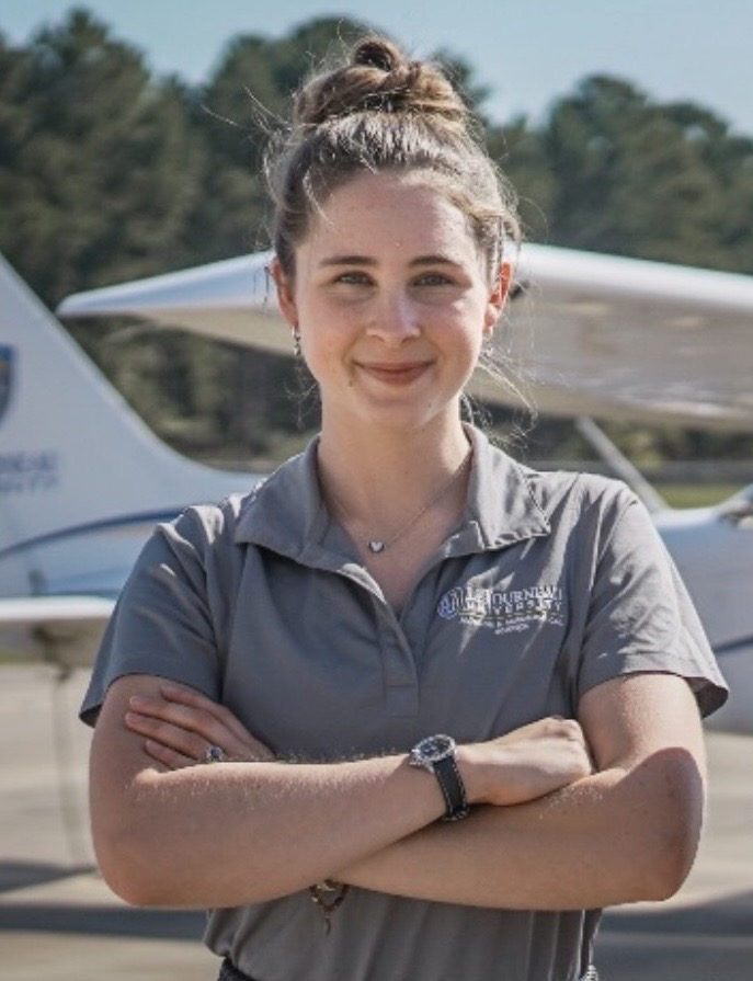 pilot in front of plane